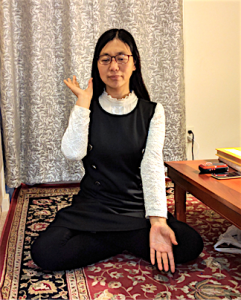 Guiying Zhang wykonująca medytację Falun Dafa (Dzięki uprzejmości Guiying Zhang)