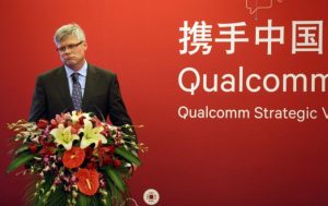 Steve Mollenkopf, dyrektor generalny Qualcomm, uczestniczy w konferencji prasowej w Pekinie, Chiny, 24.07.2014 r. (ChinaFotoPress via Getty Images)