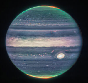 Obraz Jowisza złożony z kilku zdjęć, wykonanych przez Webb NIRCam z wykorzystaniem trzech filtrów, wyrównany ze względu na obrót planety, zdjęcie udostępnione przez NASA, wydane 22.08.2022 r. (NASA, ESA, CSA, Jupiter ERS Team/HANDOUT/PAP/EPA)