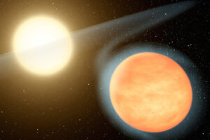 Gorąca, bogata w węgiel planeta WASP-12b i jej gwiazda macierzysta, wizja artysty. Ponieważ planeta znajduje się tak blisko swojej gwiazdy, grawitacja gwiazdy rozciąga ją lekko, nadając jej kształt jajka. Grawitacja gwiazdy ściąga również materię z planety na dysk wokół gwiazdy, pokazany tutaj w przezroczystych, białych odcieniach (NASA/JPL-Caltech / <a href="https://commons.wikimedia.org/w/index.php?curid=12351189">domena publiczna</a>)